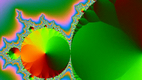 The frame at 2 seconds of naive.gif, the GIF made with no palette at 1280x720, cropped to its middle 480x270 at full size: a large orange and green disc of the Mandelbrot set filling most of the crop, with a fine regular dot texture over the discs and the teal, blue and pink background.
